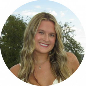 A headshot of Sarah Perrotta. She is looking into the camera and smiling